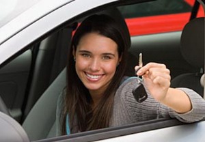 Woman holding car key